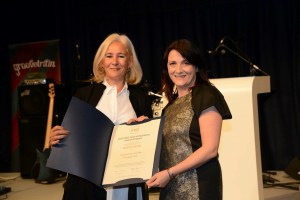 Maura Horan, College Web Officer / Manager at TCD, collecting a Fundraising award in the “‘Long Video” category with CASE President Sue Cunningham, at the CEAC 2015 Gala Dinner
